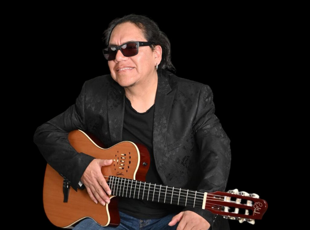 Viny Sandoval, Ecuadorian guitarist based in Toronto, Canada, performing Andean guitar.